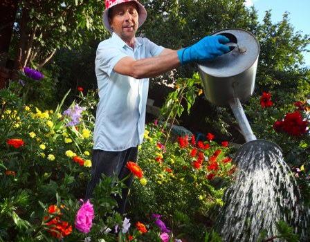 Garden team managing waste and site tidiness after outdoor work