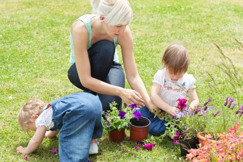 Professional gardeners applying a responsible health and safety policy
